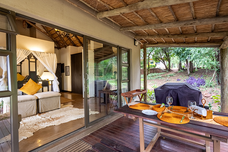 Ingwe cottage nestled in bush at Inkwazi Lodge, Royal Jozini Private Game Reserve, Lake Jozini, Eswatini